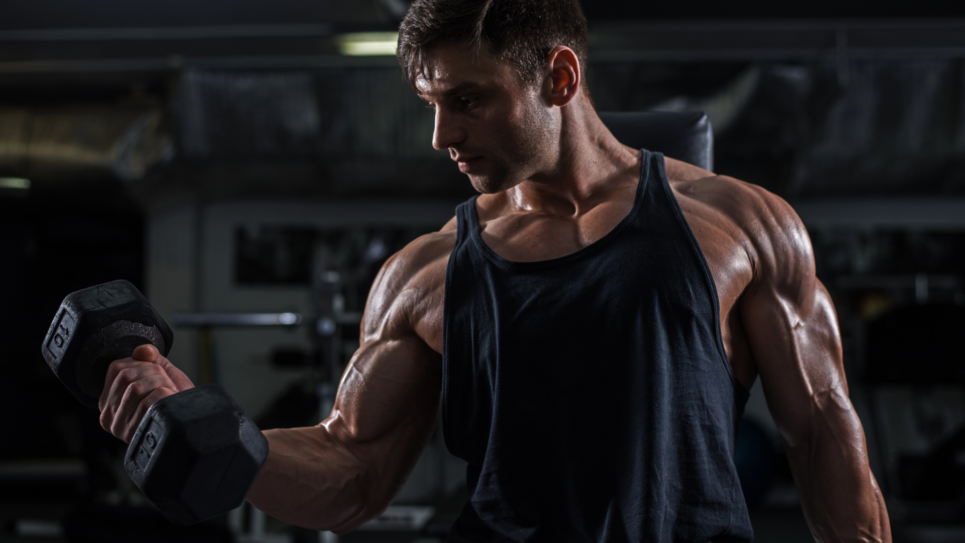 Man lifting dumbbell