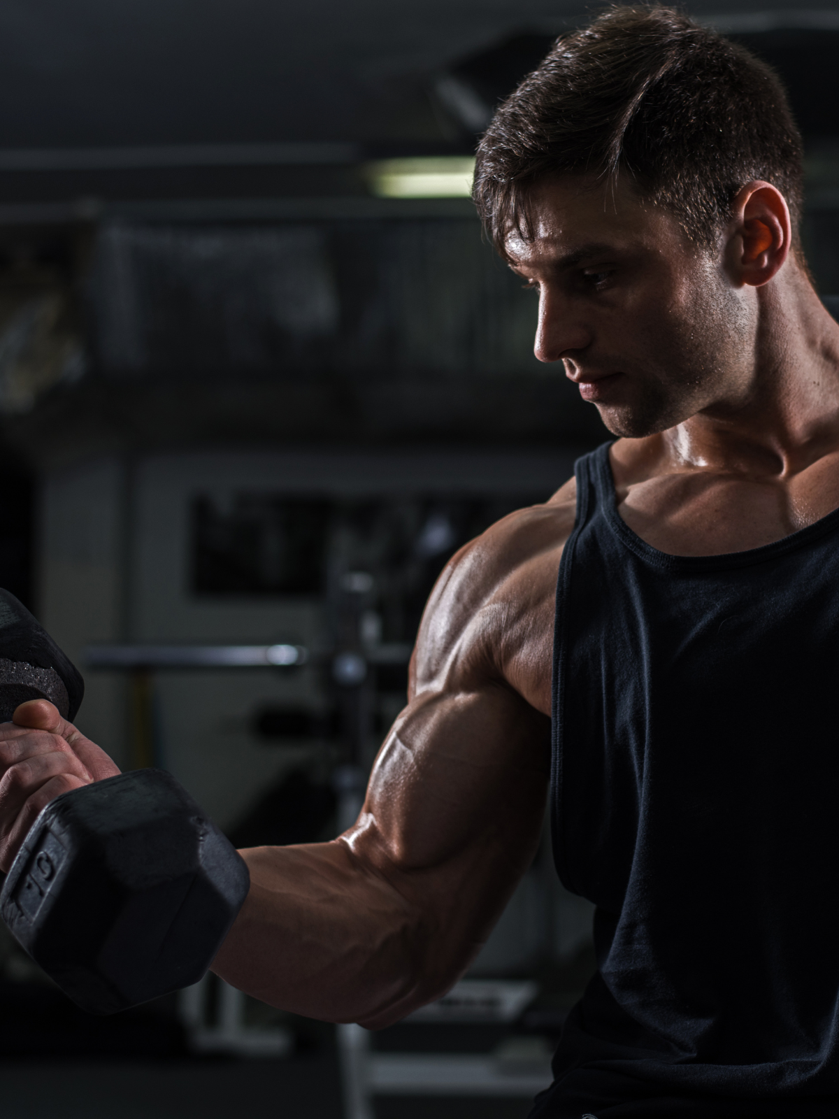 Man lifting dumbbell