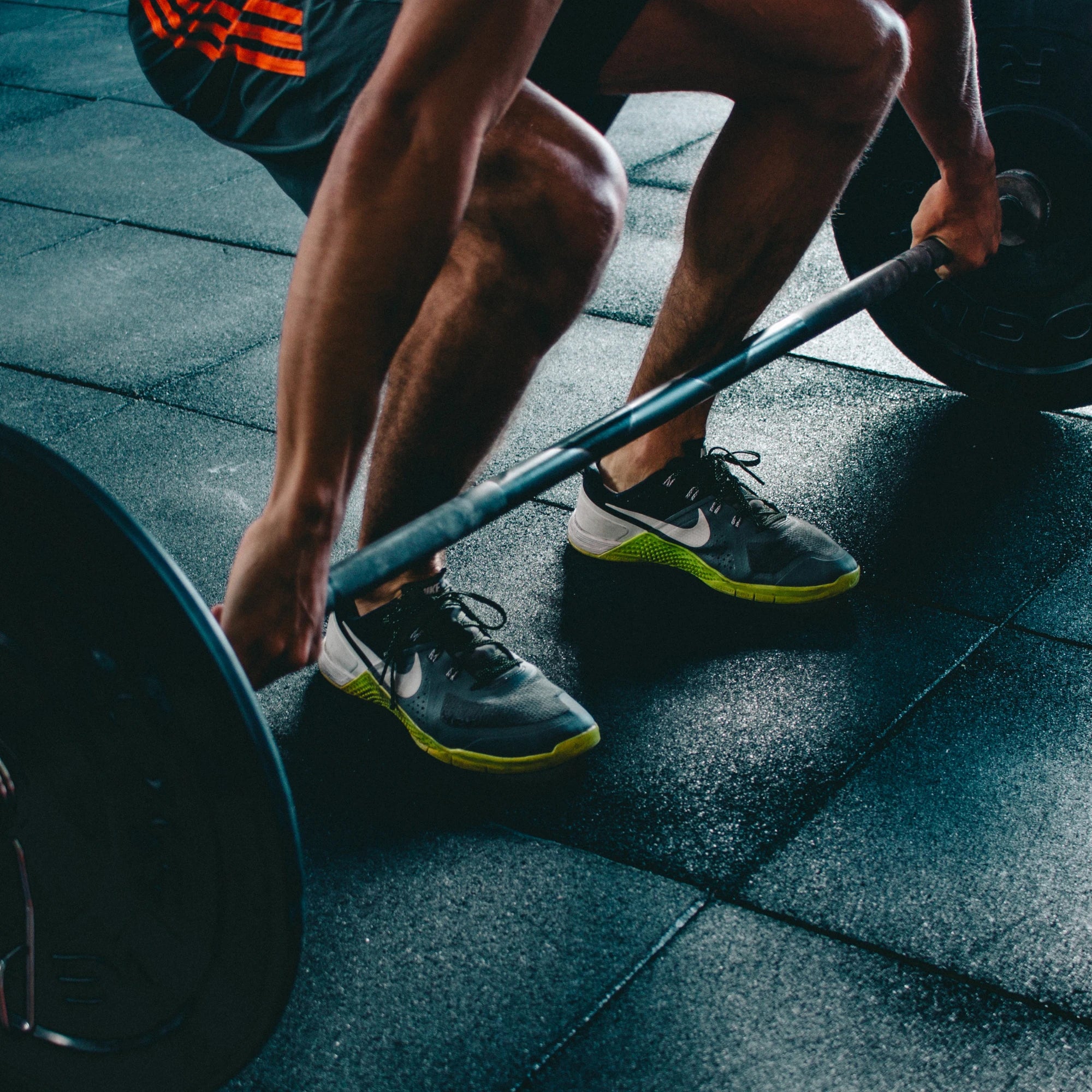 Man lifting dumbbell