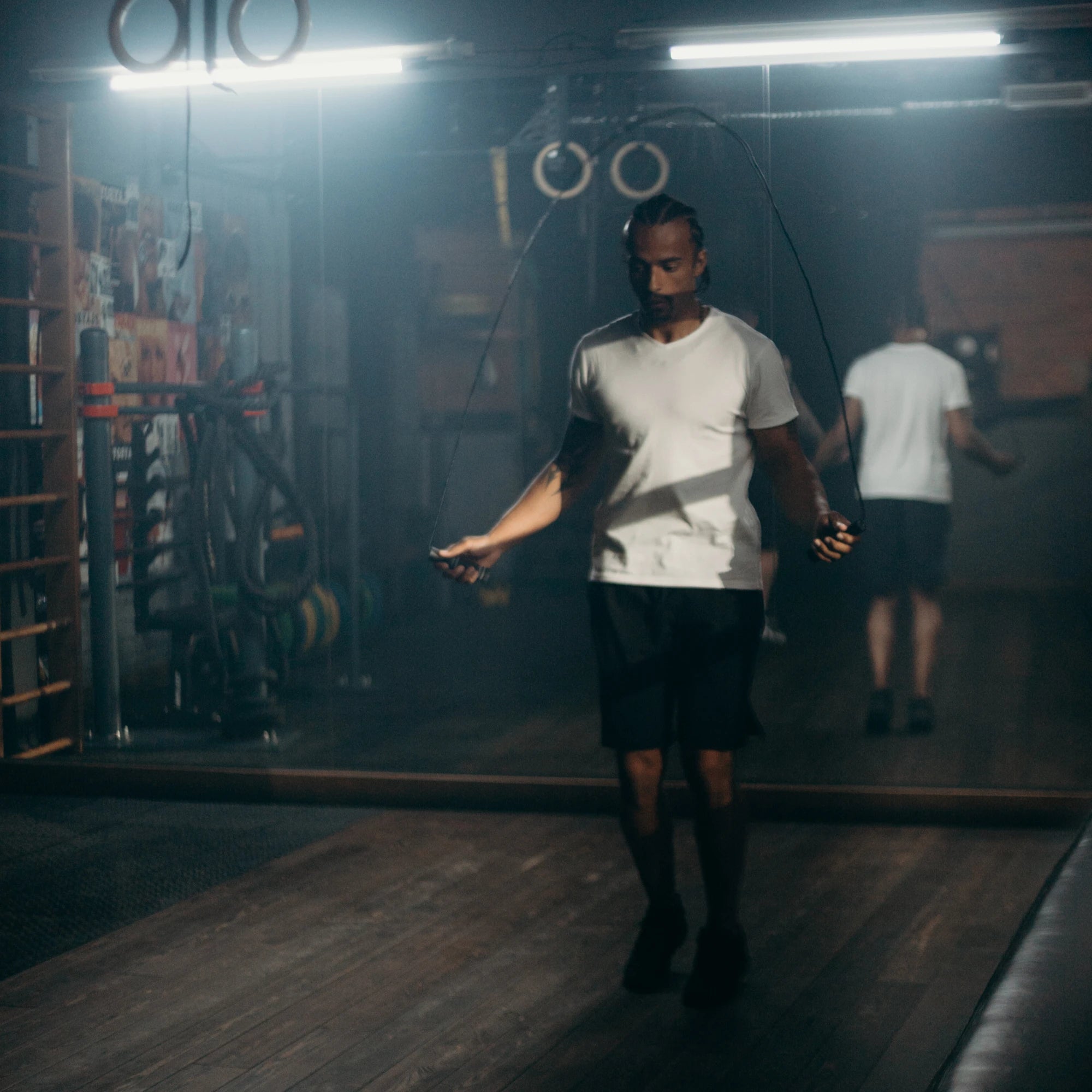 Man jumping rope in exercise