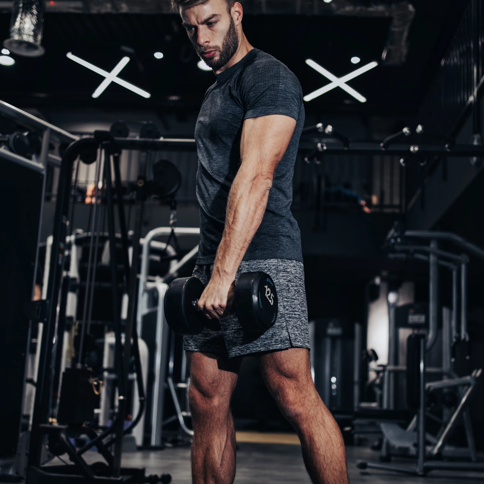 Man lifting dumbbell