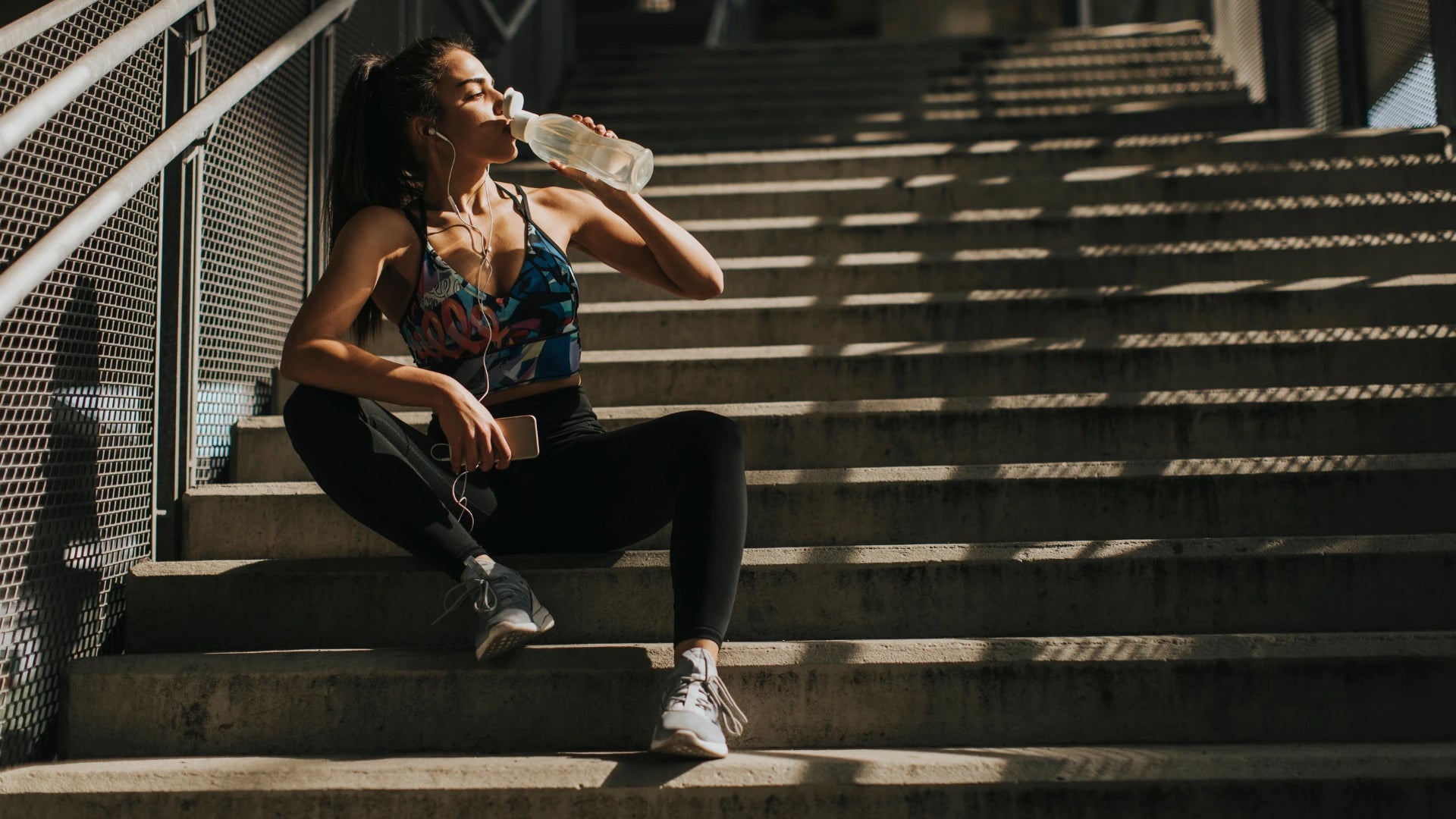 Girl drinking water from bottle